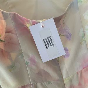 Occasion dress by boutique in London called Jarlo . Paid 180 ,open to offers